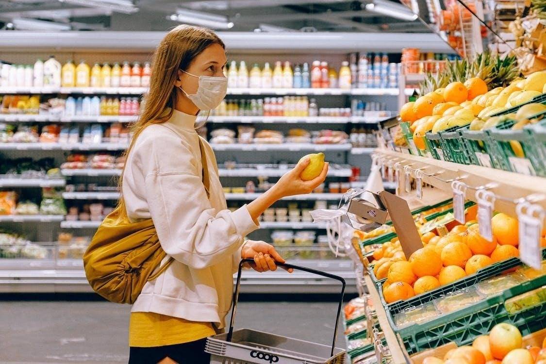 lady-shopping-vegetables-in-supermarket