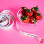 inch tape and fruit bowl on floor